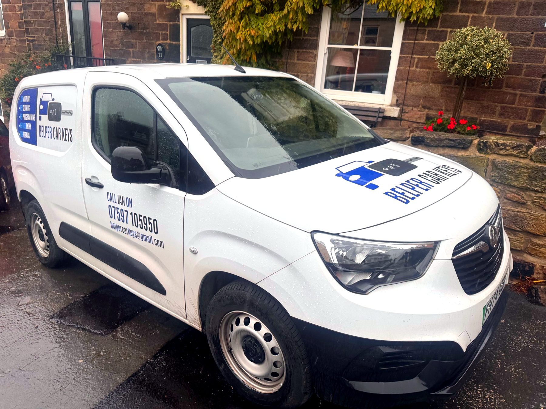 The Belper Car Keys van outside a stone cottage in Belper